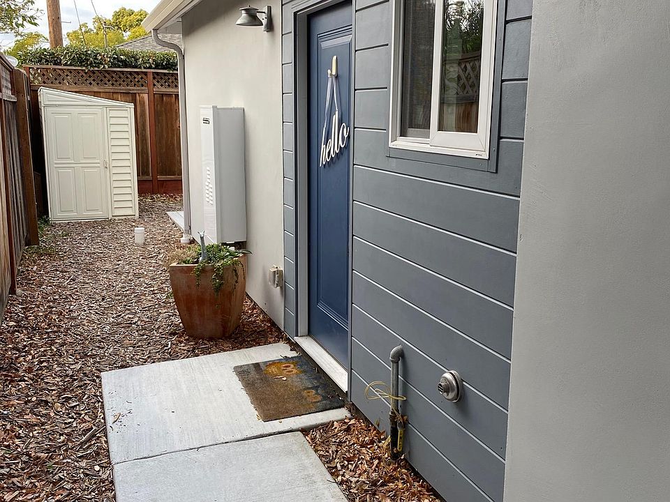 Walk up to front door with storage unit.