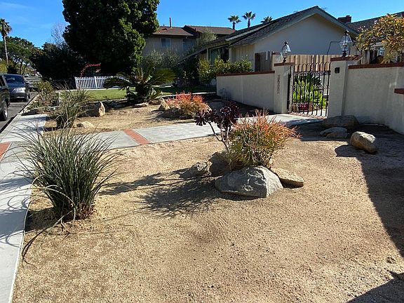 View from the driveway to the left of the Front Yard.