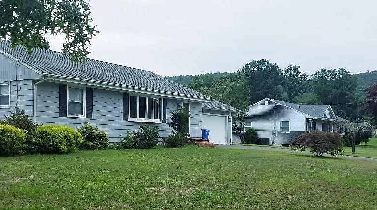 Neighborhood nestled at the base of Sleeping Giant State Park