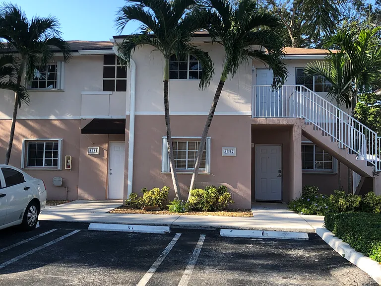 View of Outside of Townhouse with 2 (Two) designated Parking Spaces right in front of the door!