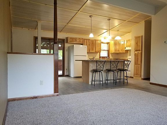 Living room facing kitchen
