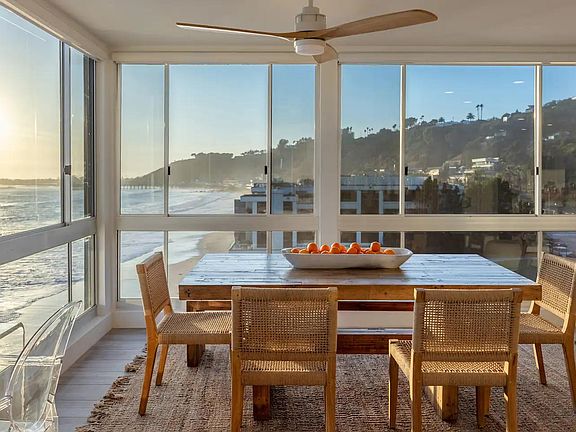 Captivate your senses in the dining room, an exquisite space for shared moments and ocean views.