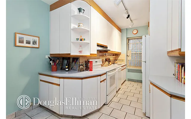 Sold by Douglas Elliman | media 18