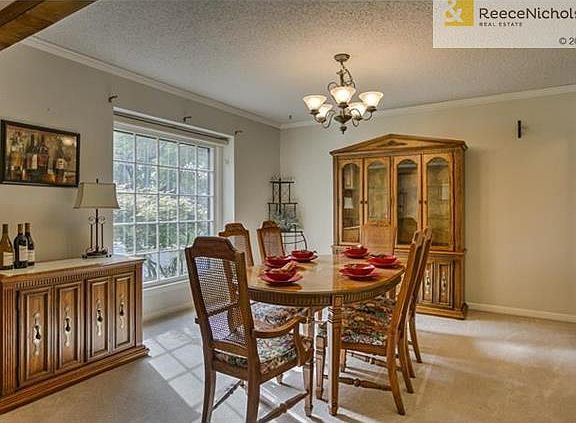Formal dining room is large enough for your dinner parties.