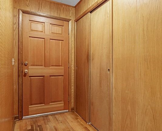Beautiful wood flooring & entry door plus a large coat closet