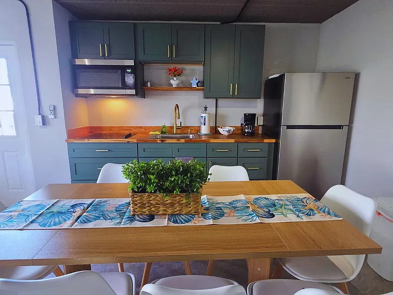 Open layout with kitchen, lounge and dining nearby