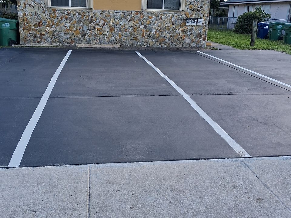 Front of the building with reserved parking.