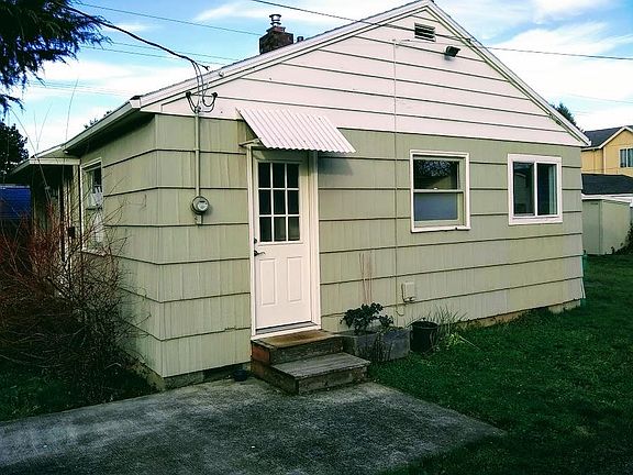 Side door leading to drive way.