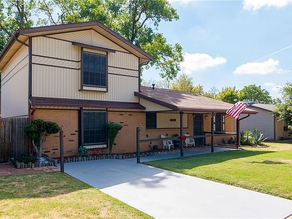 Painted driveway and walkway to the front door.  On the left of the home there is a brick  path that leads to the backyard.  There is also a gate so that you can drive to the backyard.  There is room on the left of the driveway, that can be paved to park 