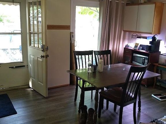 Kitchen with patio door and deck