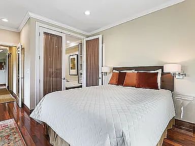 Extra Large Master Bedroom with walk-in closets, and French Door access to the deck.