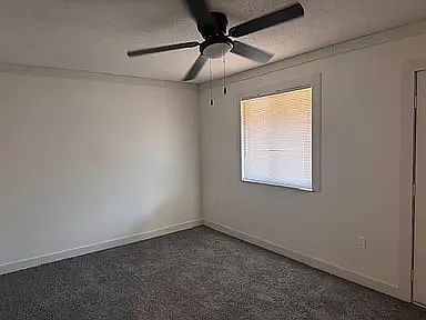 Bedroom with door to balcony