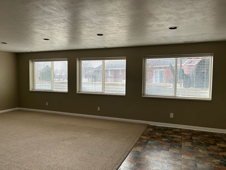 Large west-facing windows in family/living area.
