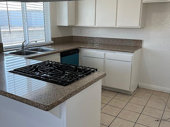 Open kitchen with plenty of cabinets
