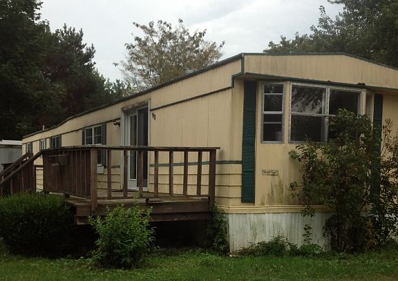 Front of home on corner