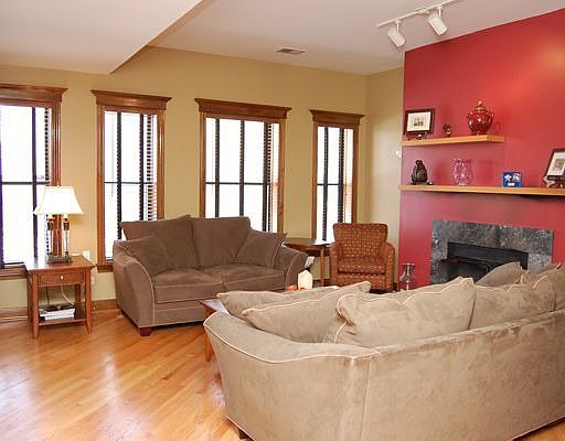 Stunning Livingroom Features Gas Fireplace with Marble Surround