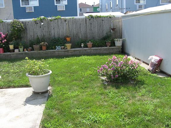 Side of shed in yard