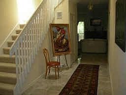Marble entry way with stairs leading to the 2nd floor. 