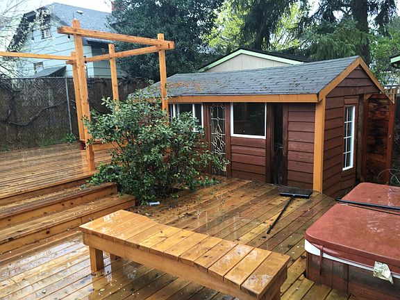 Back deck with artist studio and hot tub