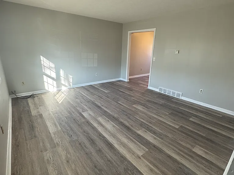 Large living room with new flooring