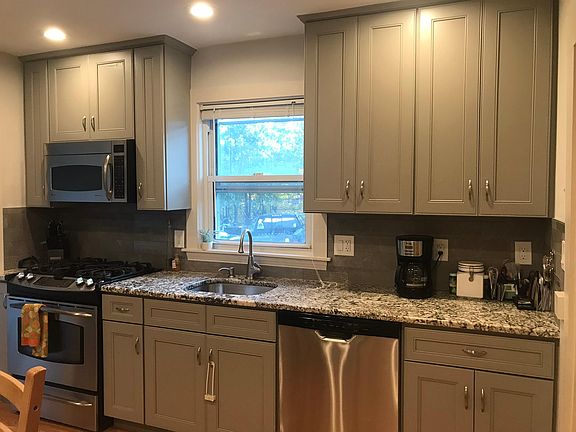 Modern new kitchen with stainless steel appliances
