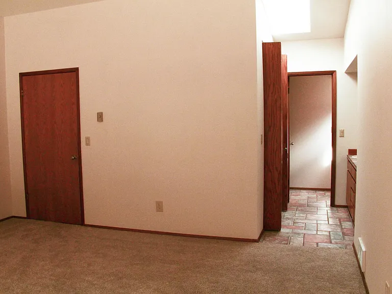 Master bedroom, walk in closet, and bathroom.