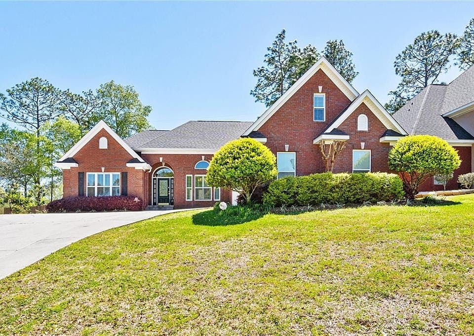 View of front of house with a front yard
