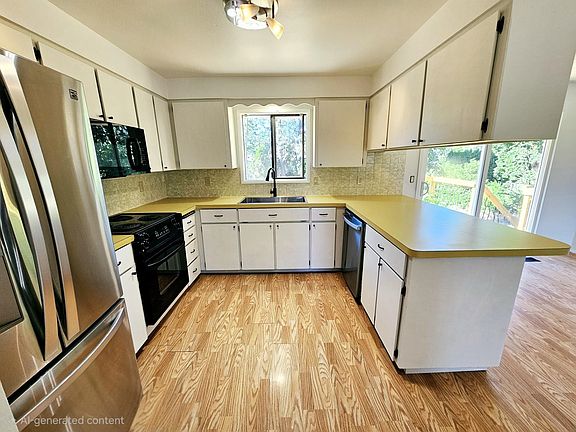 5th image of 1620 E 58th Ave