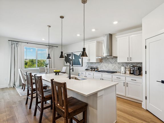 The dining room sits right off of the kitchen for convinent access.