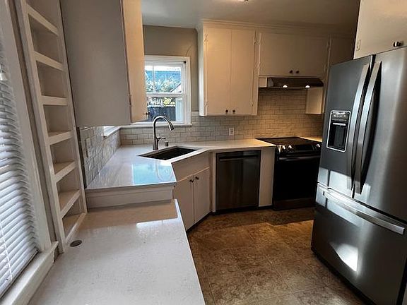Kitchen with new (one year old) appliances and countertops.