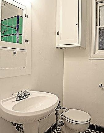 bathroom with tub and shower