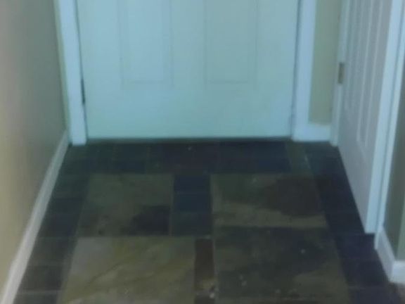 Slate tile entry that matches fireplace in LR