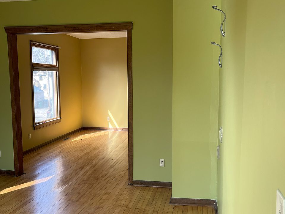 Bike hooks on wall for bike storage in living room