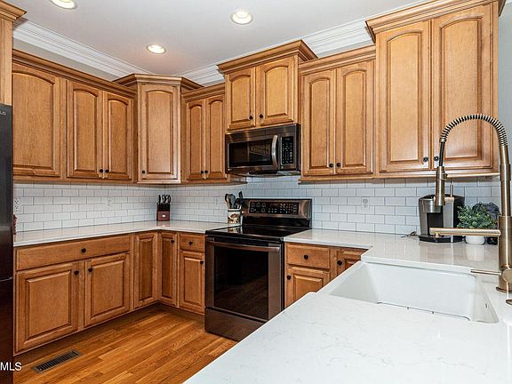 Updated Kitchen with fridge/freezer, stove, microwave and dishwasher