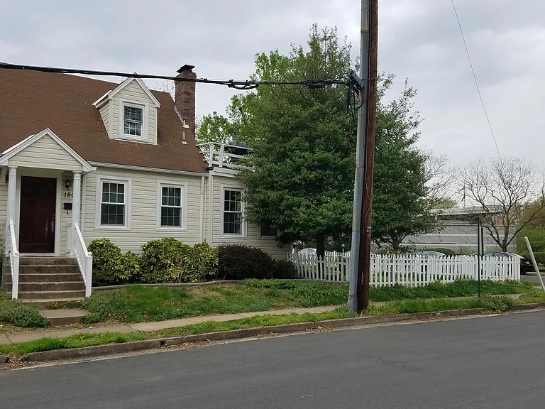 Street view shows deck on upper level