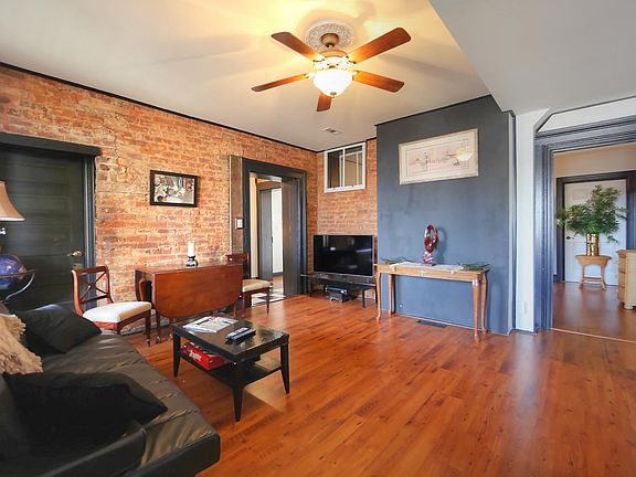 Den with TV & Entry to Second Bedroom