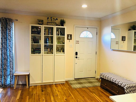 Ikea cabinets mounted to the wall are simple, clean, and adds lots of extra storage.