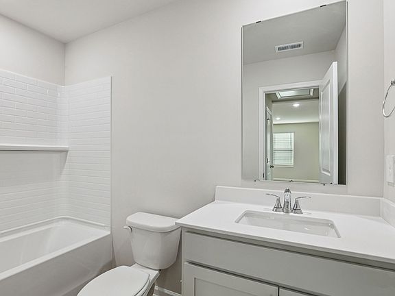 Secondary bathroom in the Dallas floorplan at a Meritage Homes community in Garner, NC.