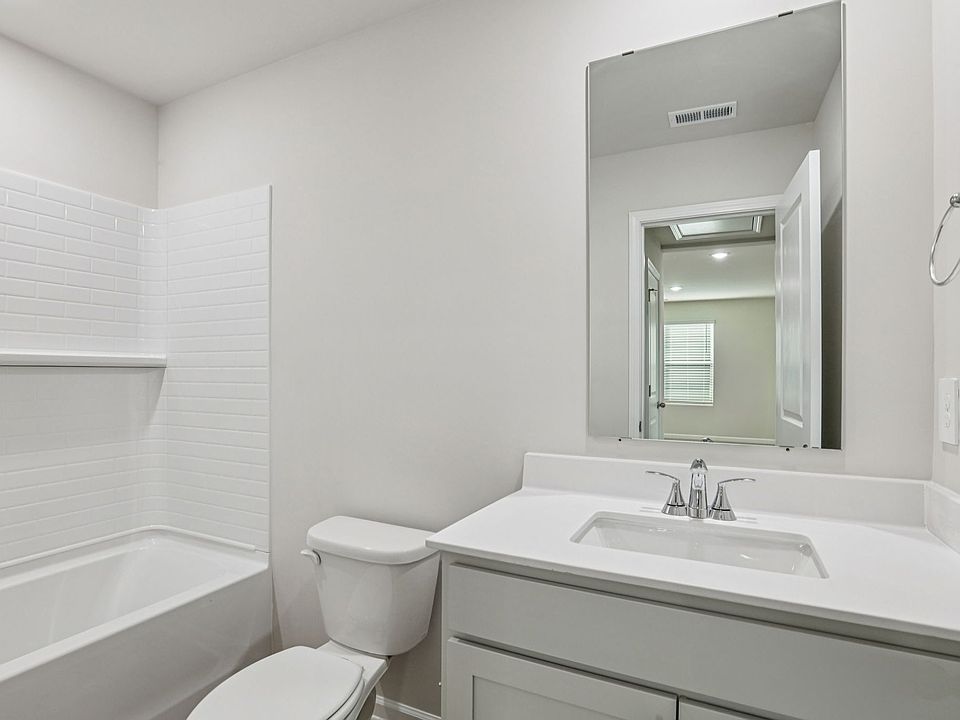 Secondary bathroom in the Dallas floorplan at a Meritage Homes community in Garner, NC.