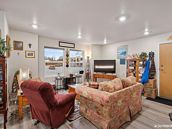 Living area, from kitchen. Facing the front of the building.