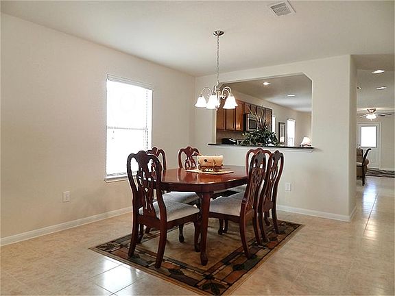 The formal dining has easy access to the kitchen.