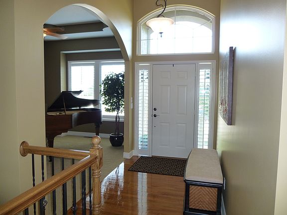 Bright and Inviting 14' Ceiling Foyer