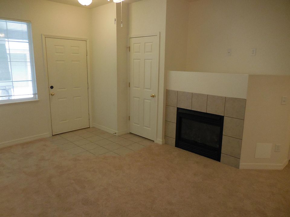 Living room with space for the TV above fire place