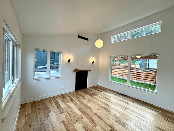 Living room with gas fireplace.