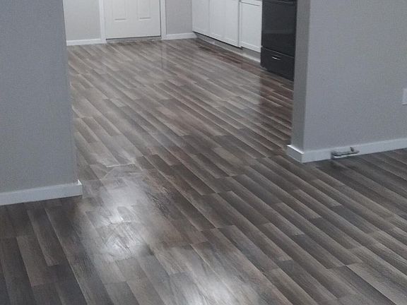 Front entry to living room. Backyard entry to kitchen.