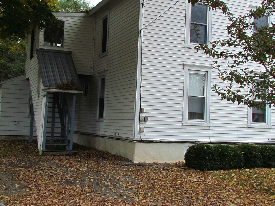 house as seen from sidewalk