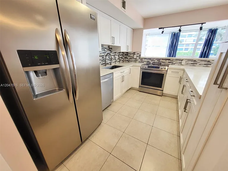 501 Three Islands Blvd #310 — Photo 17