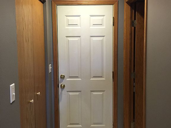 Closet and door to garage