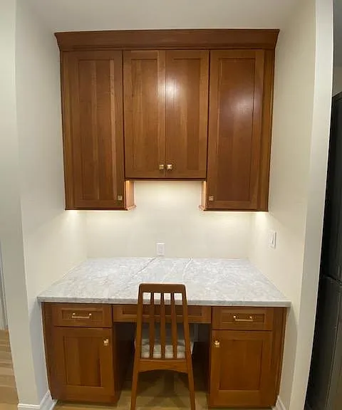 Custom cabinets and carrara marble countertop