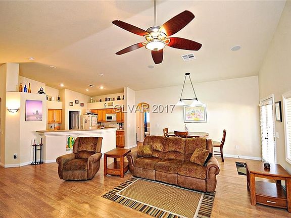 Large Great Room with vaulted ceilings and surround sound.